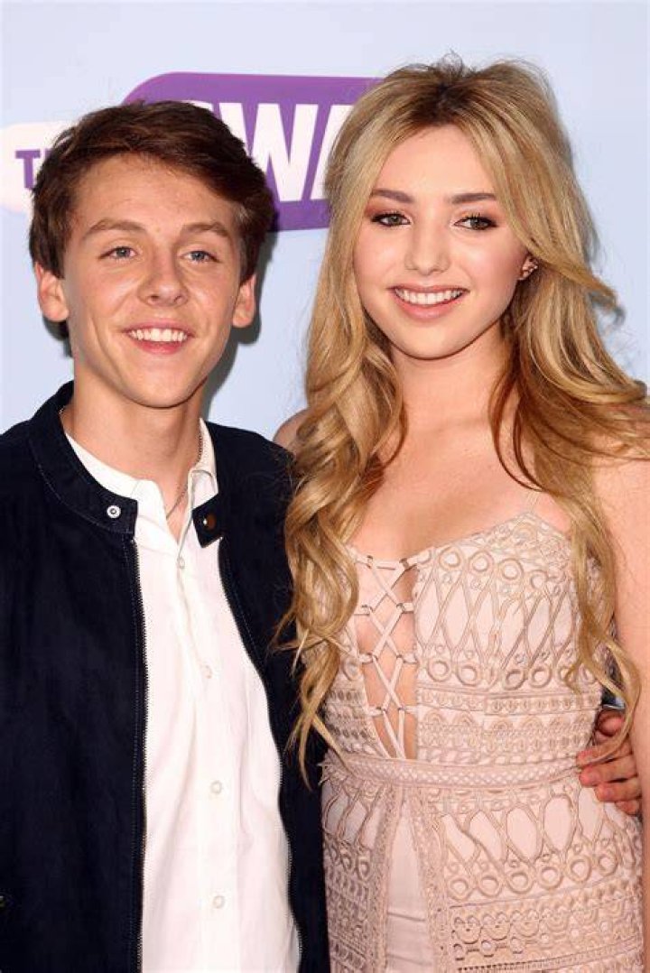 Peyton List and boyfriend Jacob Bertrand pack on the PDA while out for
